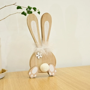 Detail of wooden Easter bunny decor with faux fur collar and floral accent on wood surface