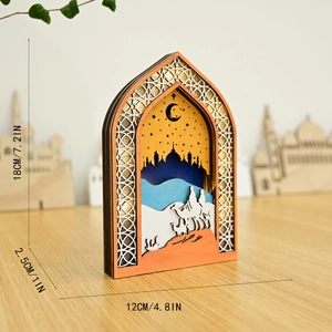 Détail d'un ornement musulman 3D en bois avec silhouettes de mosquée et chameau pour Eid