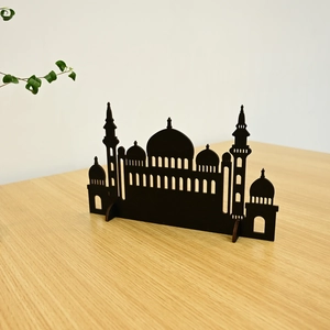Laser-cut wooden mosque ornament with a dark brown finish and intricate textures