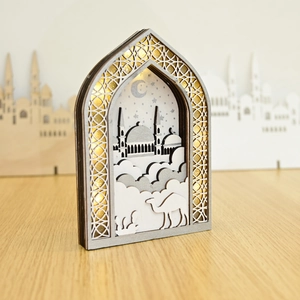 Detailed 3D laser-cut wooden mosque ornament with warm LED lighting and camel motif