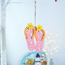 Pink flip-flop wooden hanging ornament with white floral patterns and hemp rope loop