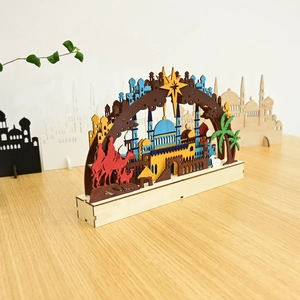 Intricate laser-cut wooden moon lamp with middle-eastern architectural and camel silhouette