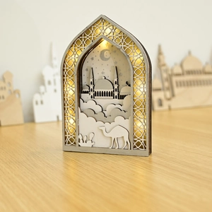 Detailed laser-cut wooden Ramadan lantern with LED light and Islamic mosque silhouette