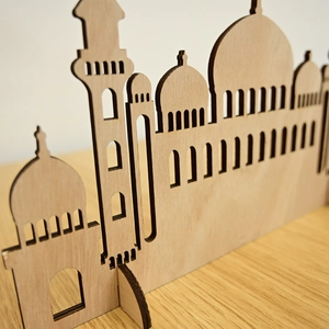 Laser-cut wooden Islamic building ornament with dome details for Ramadan decor