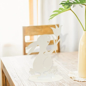 White metal Easter bunny silhouette with tulip flower for minimalist garden decor