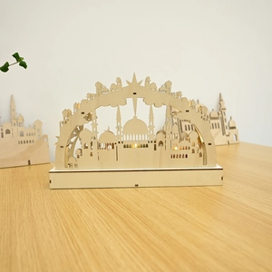 Close-up of laser-cut wooden moon lamp with warm LED light for Ramadan decoration