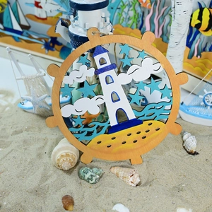 Detail of wooden nautical steering wheel decor with 3D lighthouse and ocean waves scenary