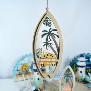 Detail of wooden surfboard pendant with layered palm tree carving and Ibiza van
