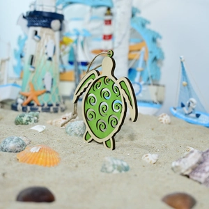 Mediterranean wooden sea turtle wall decor with green spiral cutout and hemp rope