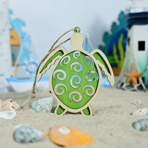 Mediterranean sea turtle wooden wall hanging with rustic rope on a beach background