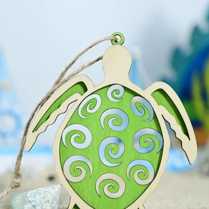 Macro view of turtle wooden plaque with green hollow patterns and hemp rope decor