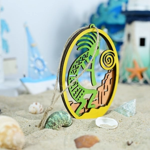Kokopelli wooden wall decor with laser-cut nautical theme and beach background setup