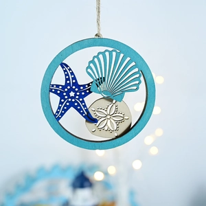 Detail of wooden ocean hanging ornament with starfish shell and sand dollar elements