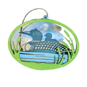 Mediterranean nautical wooden plaque with laser-cut loon design for coastal home decor