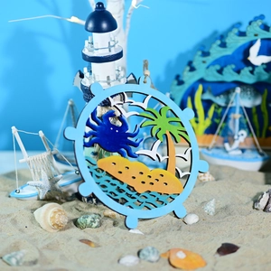 Close-up of layered nautical wooden wheel decor with blue crab and coconut tree