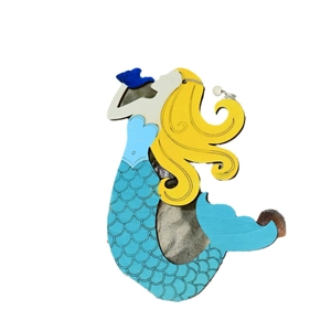 Nautical wooden mermaid wall hanging with yellow hair and sand-filled blue scale body