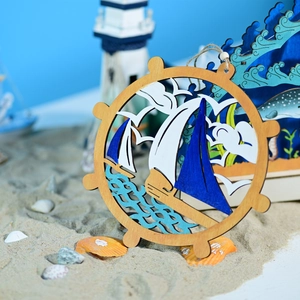 Detailed laser-cut wooden ship wheel pendant with hand-painted nautical ocean elements