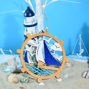 Detail of wooden nautical ship wheel decor with sailboat and sea wave cutout