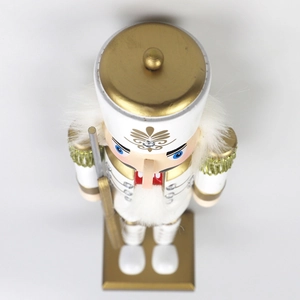Top-down view of 30cm white and gold wooden nutcracker soldier with a golden rifle