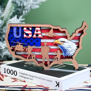 Multi-layered wooden USA map silhouette with patriotic eagle and military motifs
