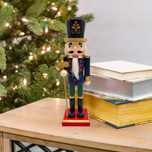 Classic 25.5cm blue soldier nutcracker with golden axe on festive background