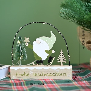 Detail of wooden Christmas gnome ornament with LED light and Frohe Weihnachten text