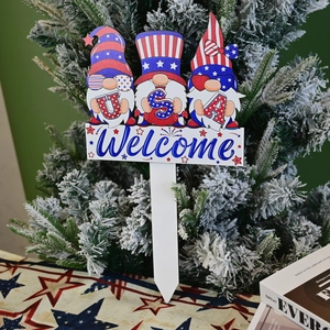 Detail of USA Gnome Welcome yard stake featuring patriotic red white and blue theme