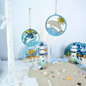 Detailed view of layered wooden marine ornaments with dolphin and orca motifs and ropes