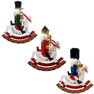 Detailed view of three vintage wooden nutcracker soldiers on rocking horses for Christmas decoration
