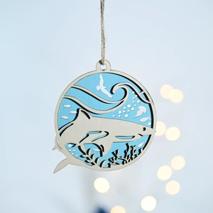 Detailed laser-cut multi-layer wooden ocean ornament with a shark and nautical elements
