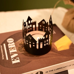 Nordic black metal hollow house candle holder with round base for dinner decor