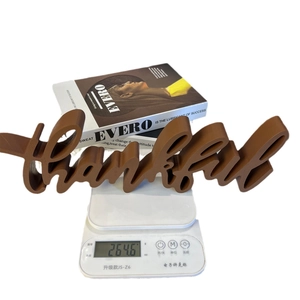 Rustic brown wood thankful letter sign for home decor showing 264.6g weight on scale