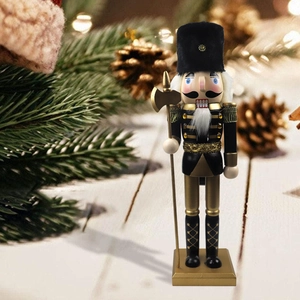 Retro black and gold Nutcracker soldier ornament with gold halberd for Christmas decor