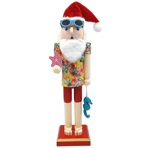 Hawaiian wooden nutcracker in floral shirt with starfish and seahorse on white base