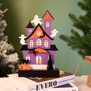 Detailed view of glowing wooden Halloween haunted house with LED lights and ghost icons