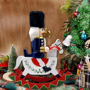 Detail of wooden nutcracker soldier on rocking horse with festive Christmas tree background