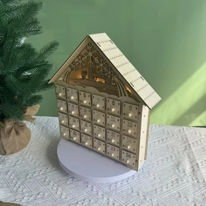 White wooden advent calendar house with 24 drawers and LED lights for Christmas decor