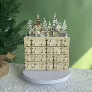 Wooden Christmas advent calendar with 24 drawers and carved winter village scenery