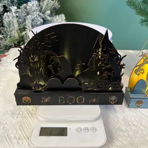Detail of wooden Halloween LED bridge light with haunted castle and ghost cutouts