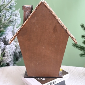 Gray wooden 24-day advent calendar house with chimney for Christmas home decoration