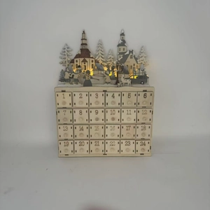 Detailed view of a wooden Christmas advent calendar with 24 drawers and LED light scene
