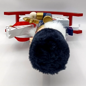 Top-down view showing the black plush hat texture of a 30.5cm wooden nutcracker rocking horse