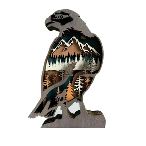 Multi-layer wooden eagle silhouette with forest scenery and laser-cut animal details