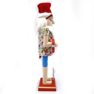 Side view of Hawaiian Nutcracker wearing a parrot shirt and holding a lifebuoy
