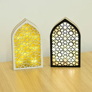Close-up of LED wooden Muslim festival ornaments with geometric star patterns and warm light