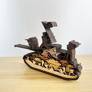 Detail of multi-layered wooden tank sculpture with laser-cut military battle scene