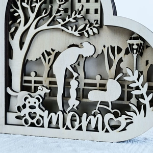 Detailed close-up of multilayer laser-cut heart wooden decor for Mom with family scene