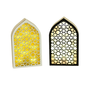 Pair of Islamic style LED lanterns with geometric star cutouts and warm yellow light