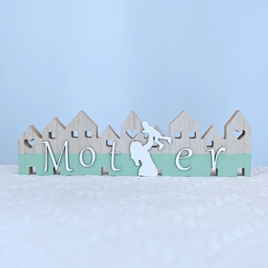 Détail de décoration de fête des mères en bois avec finition vert menthe et texte