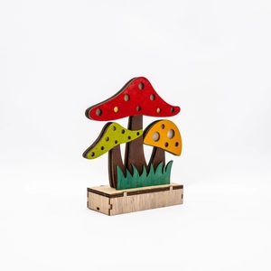 Detail of multi-layered wooden forest mushrooms on base for Thanksgiving decor
